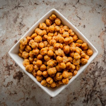 Roasted chickpeas in a white bowl.