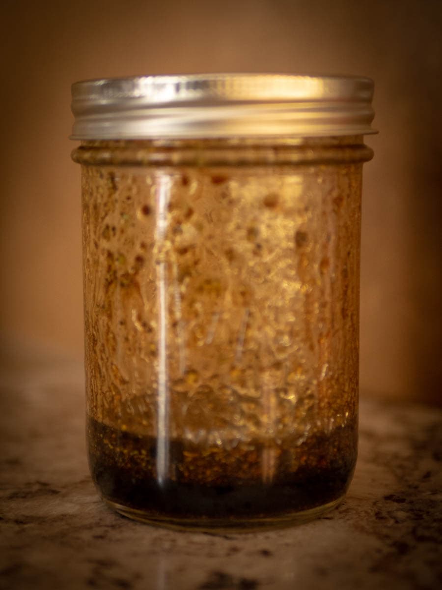 Jar with mixed vinaigrette.
