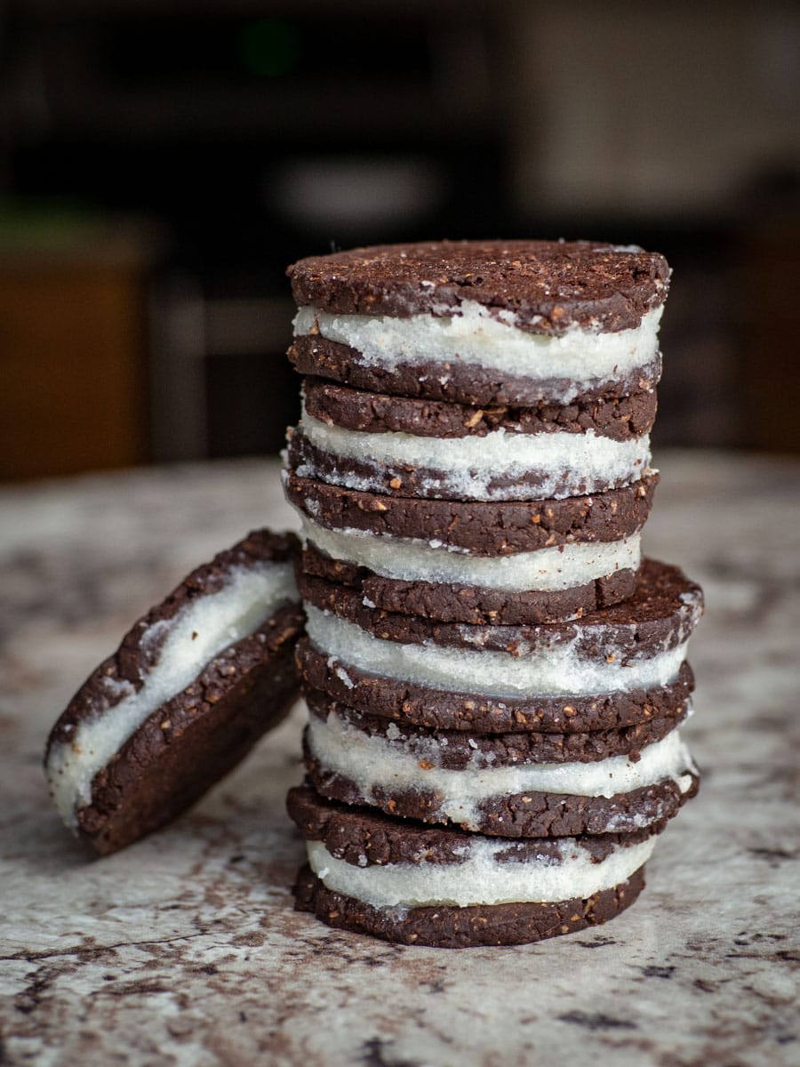 Stack of homemade Oreo-inspired cookies on a counter top.