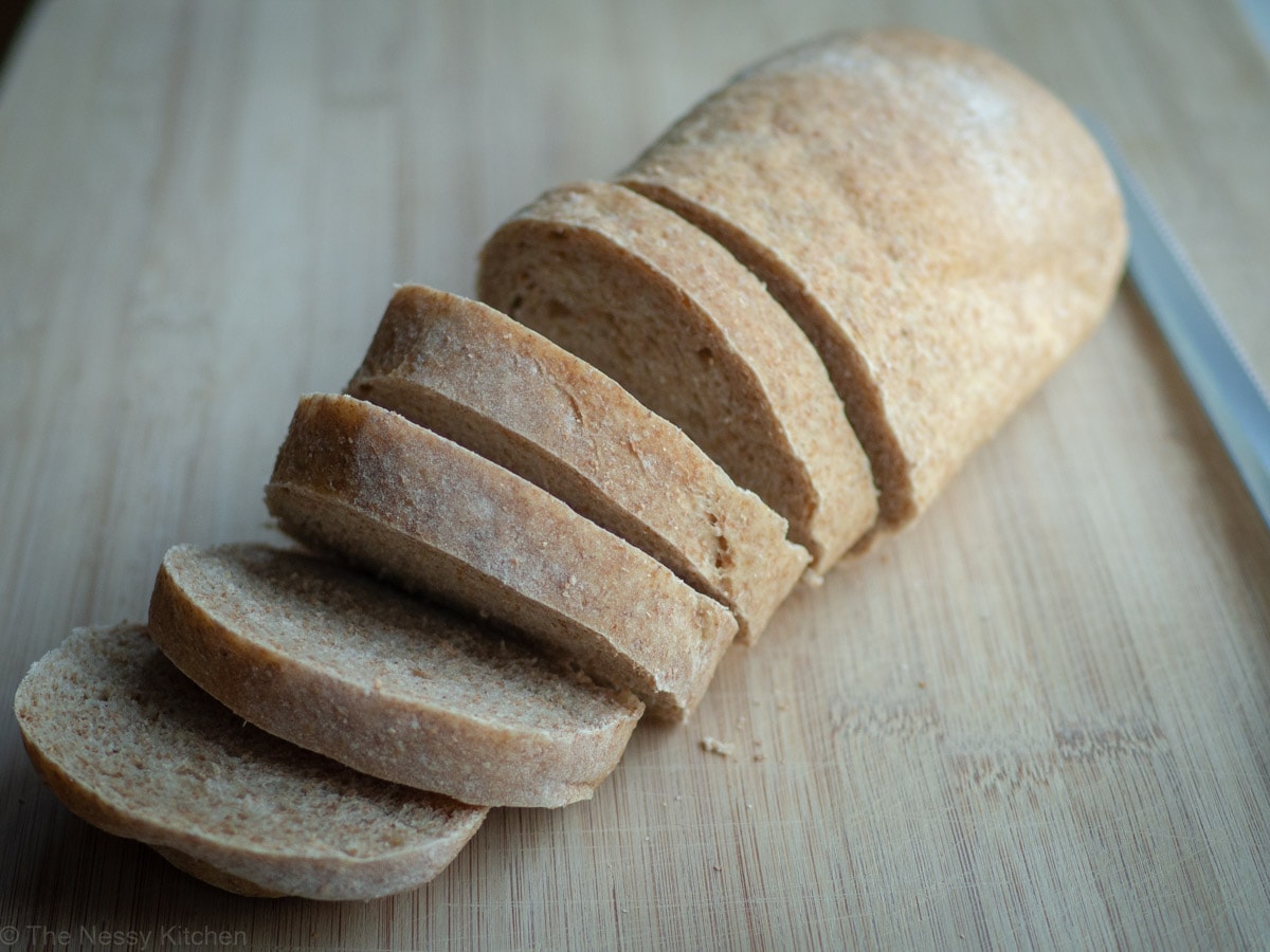 Partially sliced loaf of sandwich bread.