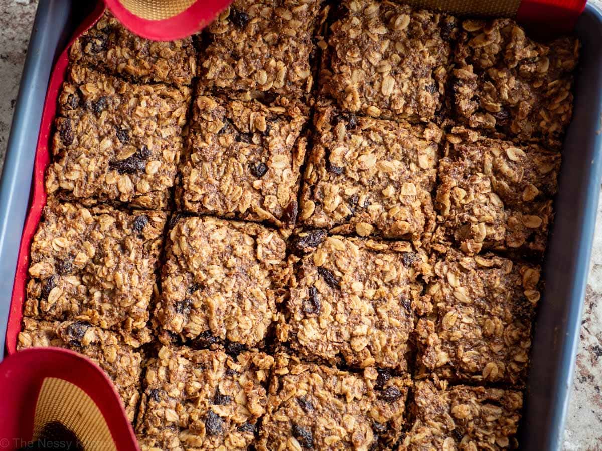 Baked cookie bars sliced in a pan.