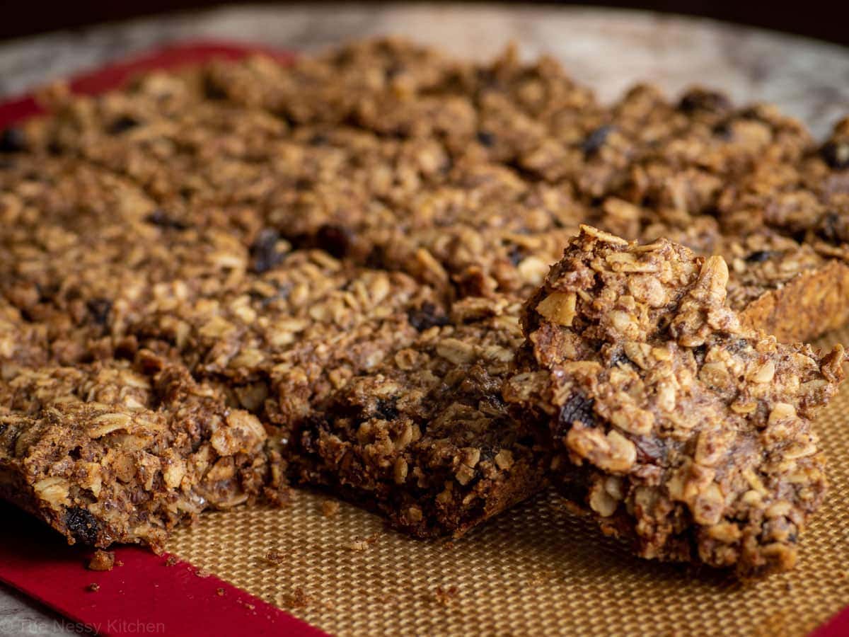 Cookie squares on a cutting board.