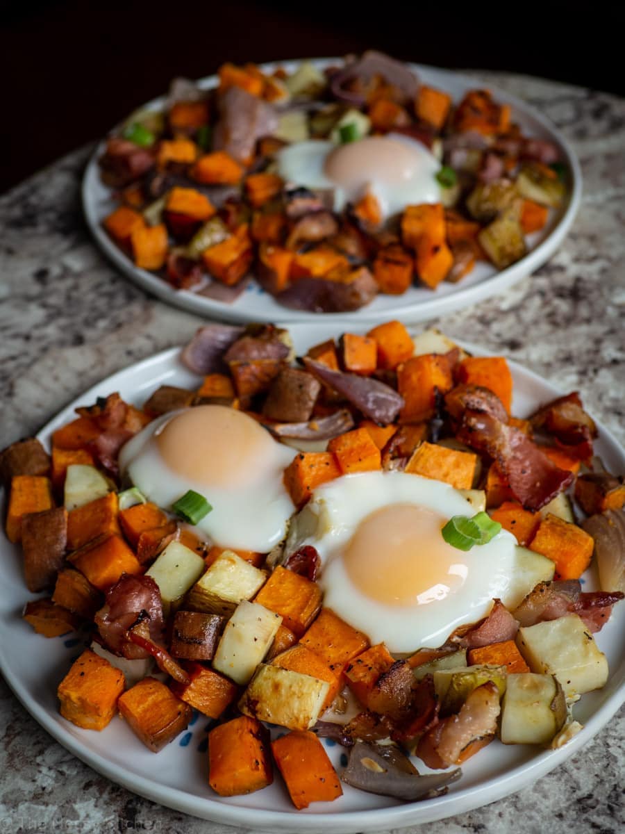 Completed dish divided between two plates.