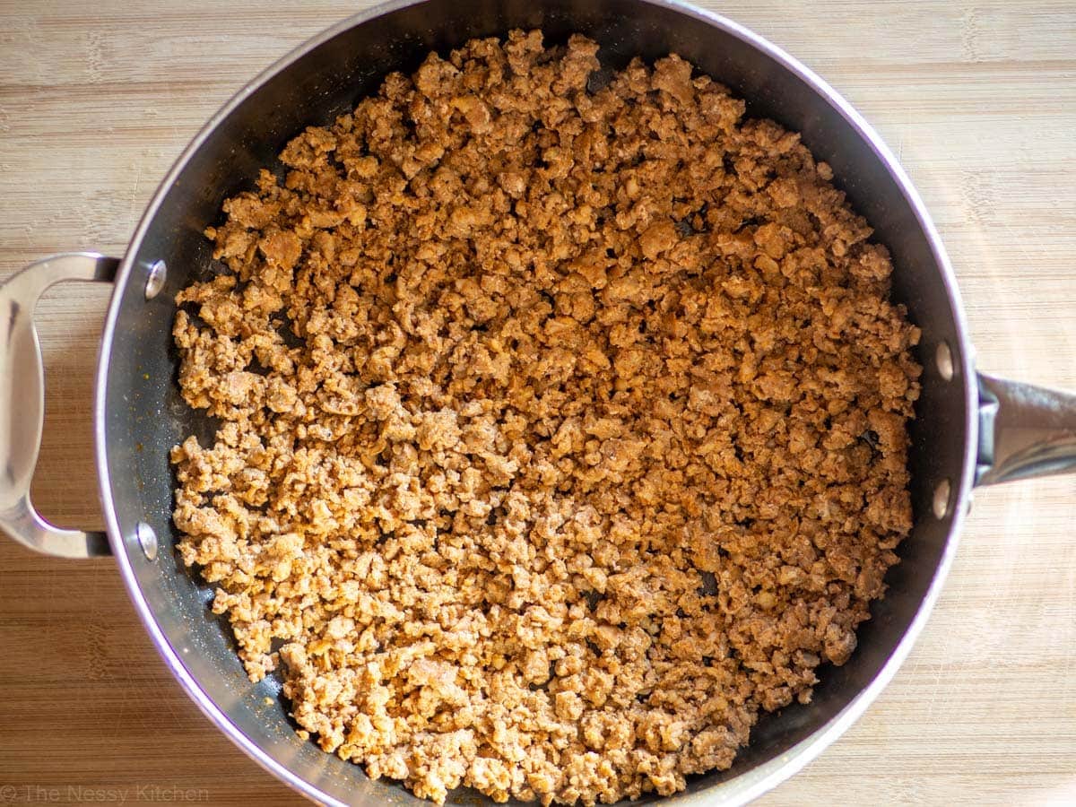 Browned Chorizo in a skillet.