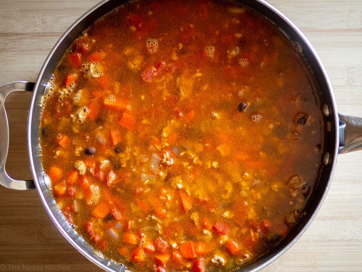 Water stirred in to skillet with other ingredients.