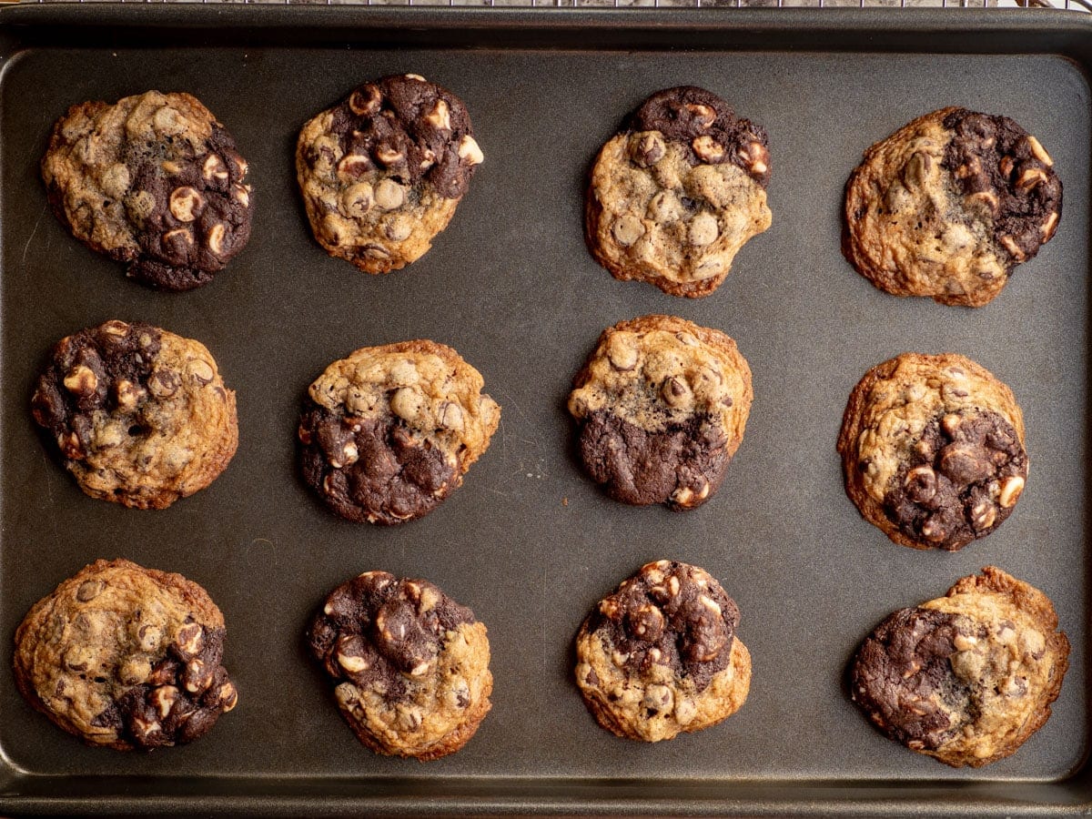 Cookies on a sheet pan with lightly browned edges.