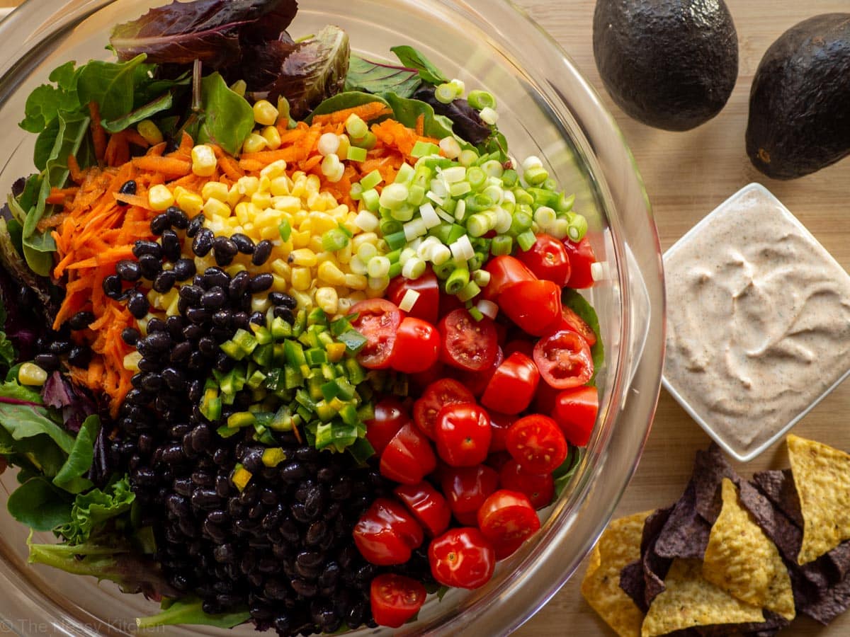 Salad unmixed in a bowl.