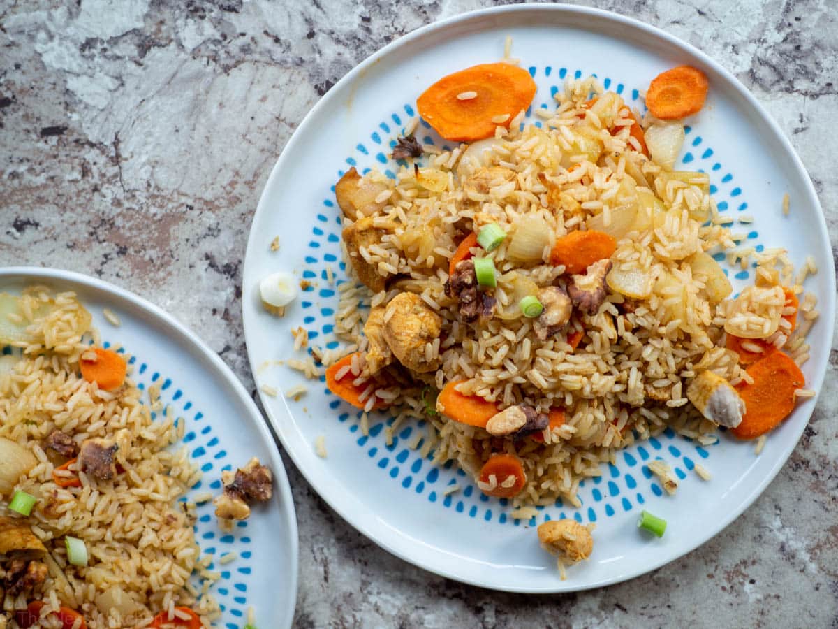 Maple cumin chicken with carrots and onions mixed into rice.