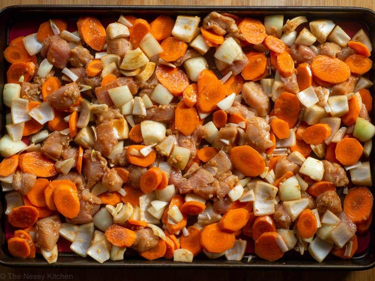 Ingredients for recipe mixed and spread onto a sheet pan.