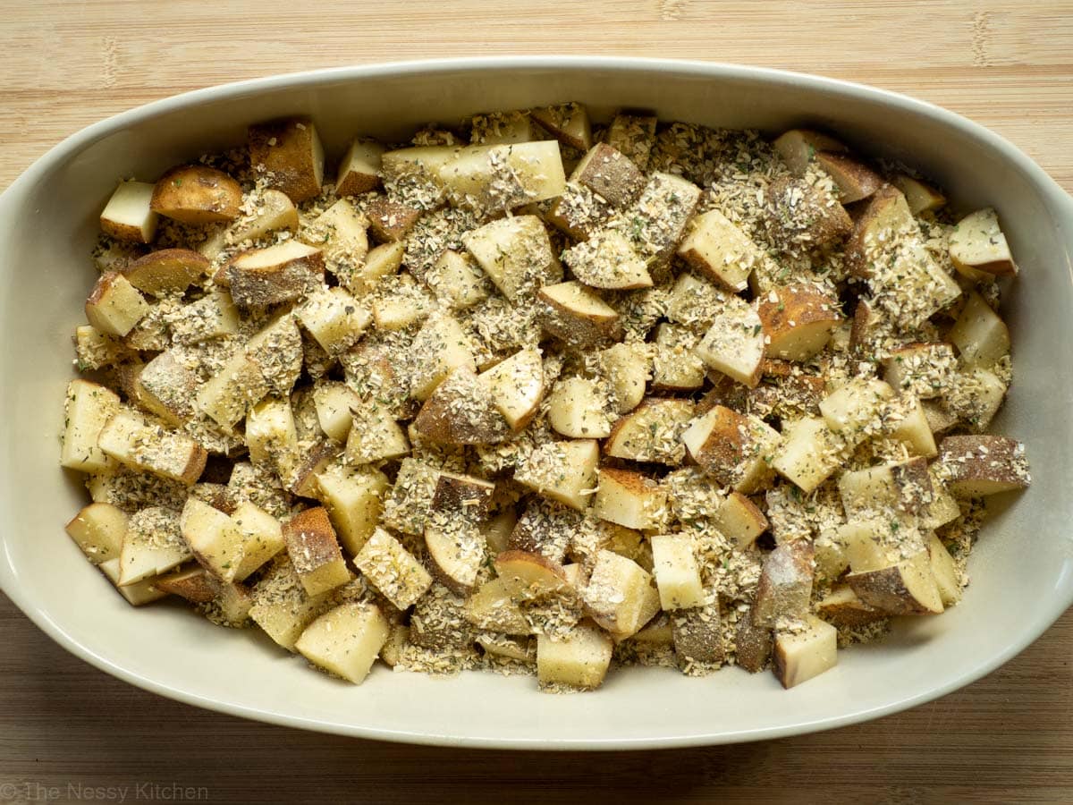 Spices, butter and oil added to potatoes.