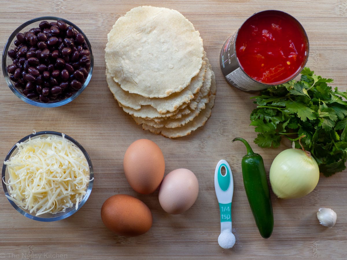 Ingredients for homemade huevos rancheroes and sauce.