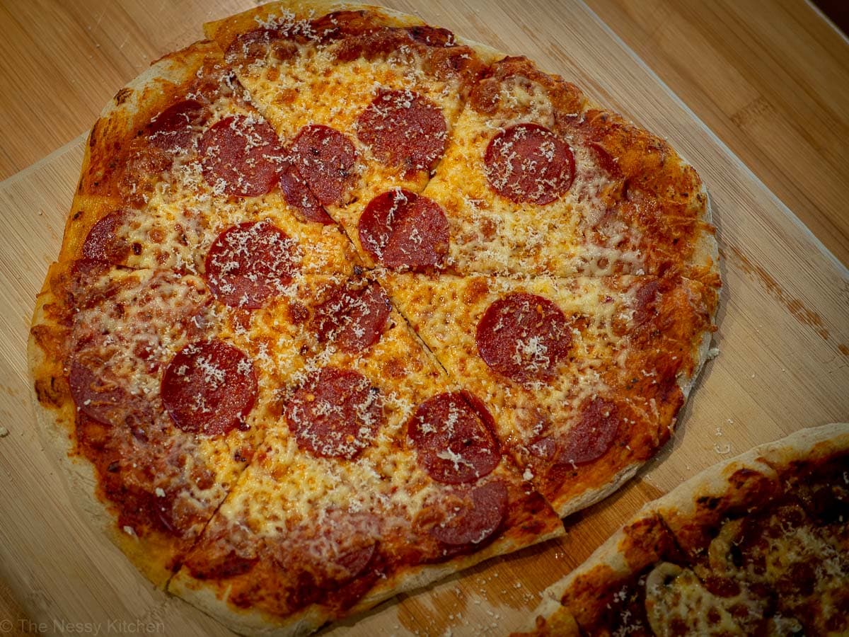 Pizza sauce on a pepperoni pizza.