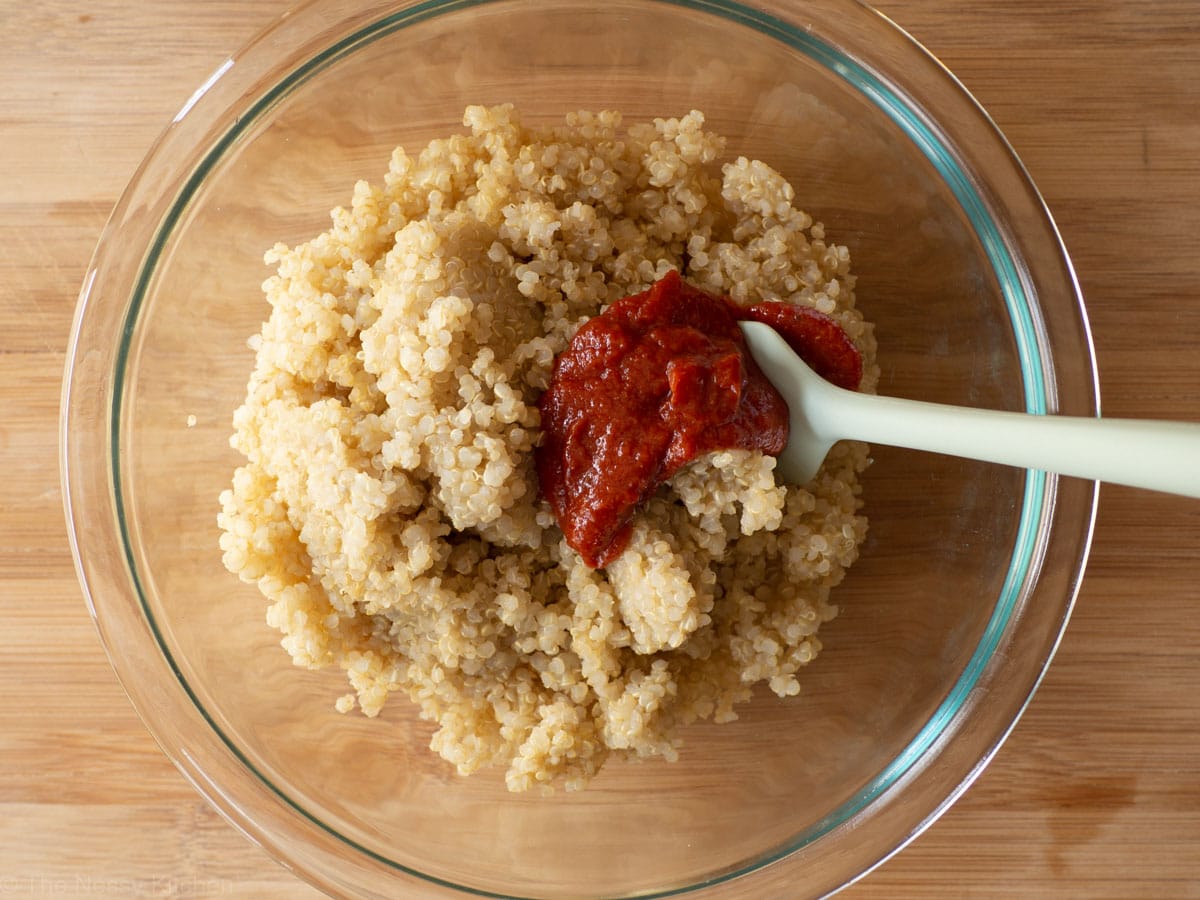 Quinoa mixed with pizza sauce.