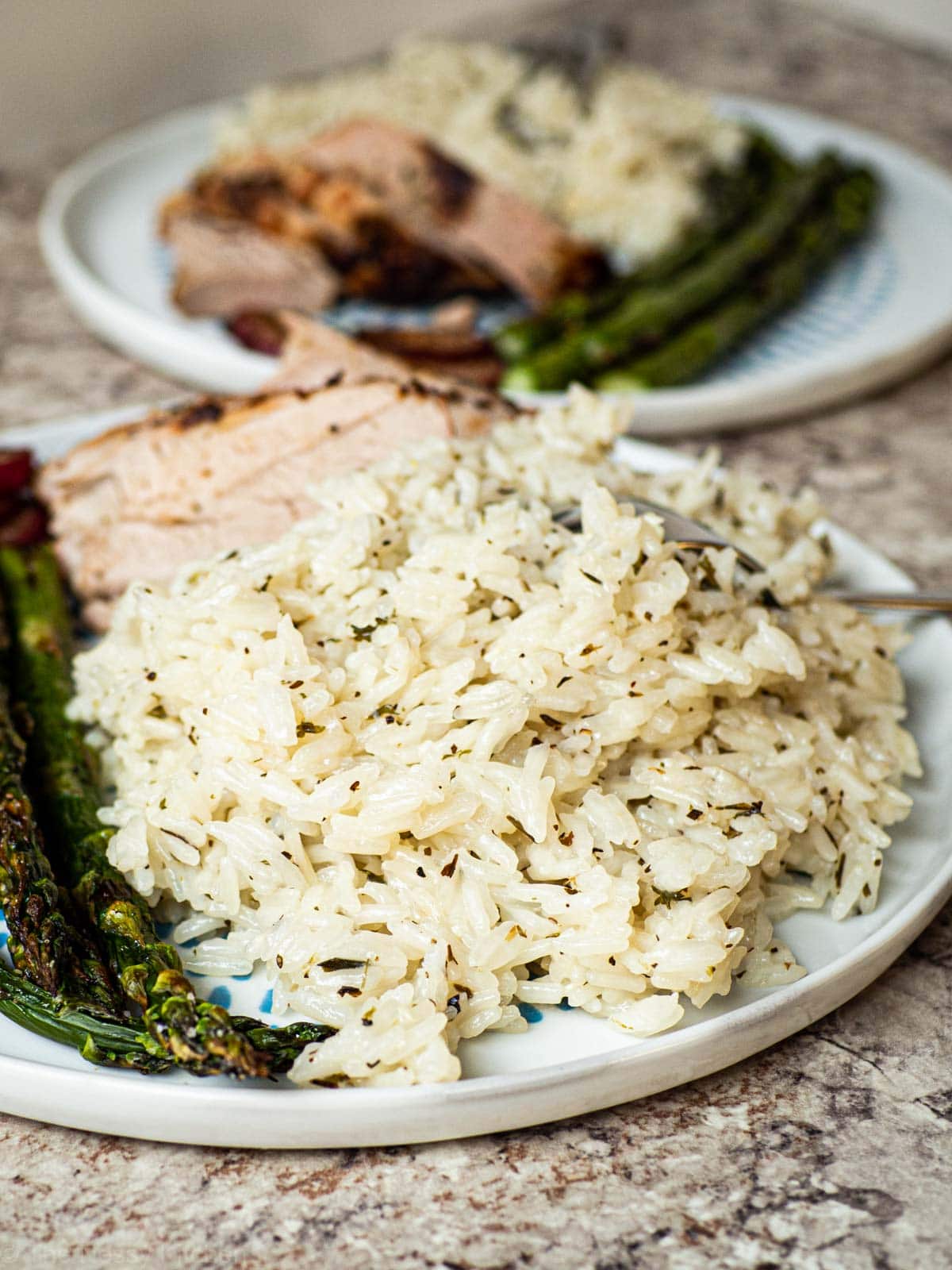 Plate of rice with asparagus.