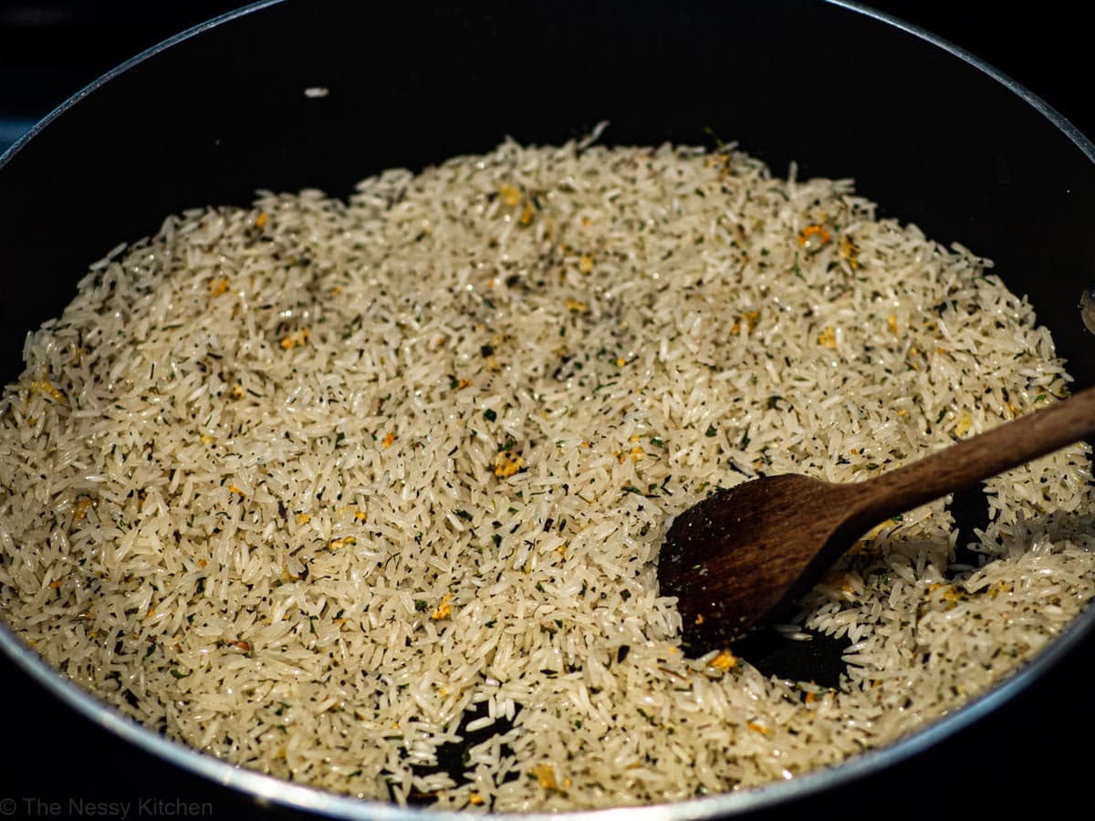 Rice toasting in garlic butter.