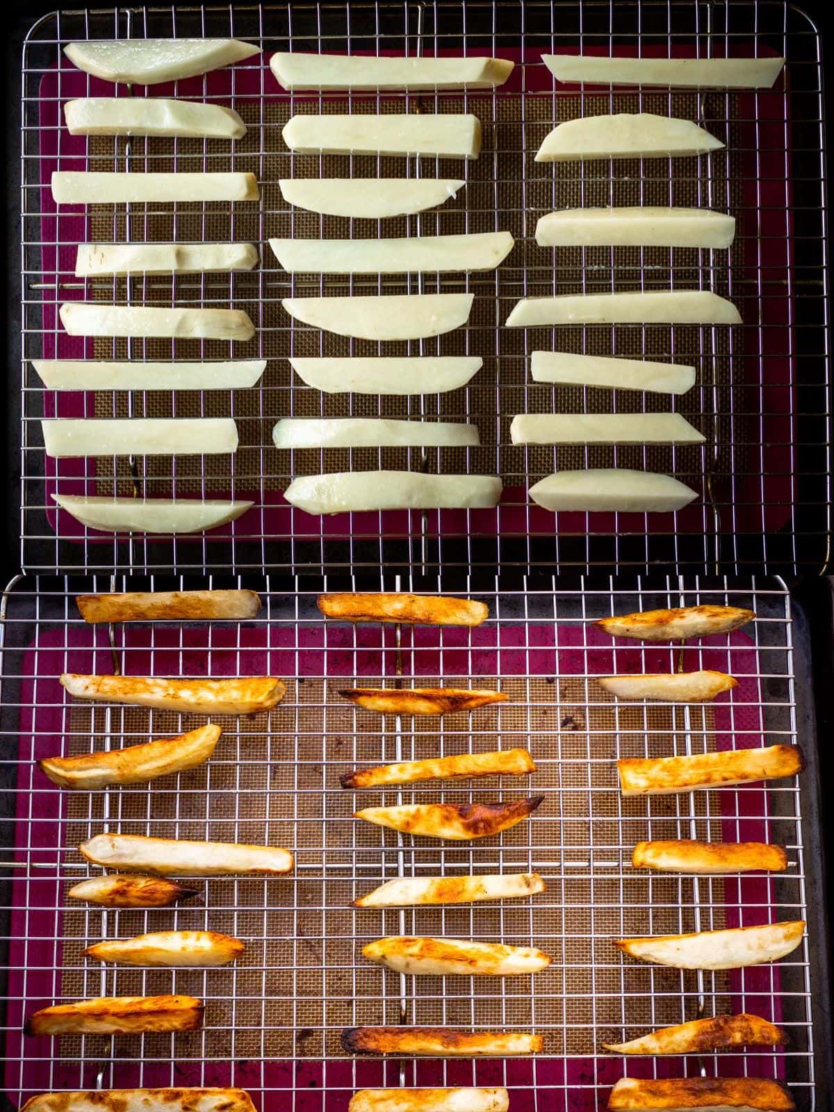 Fries positioned on an oven safe bake rack on top of a cookie sheet.