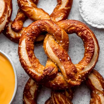 Soft baked pretzels on a countertop.