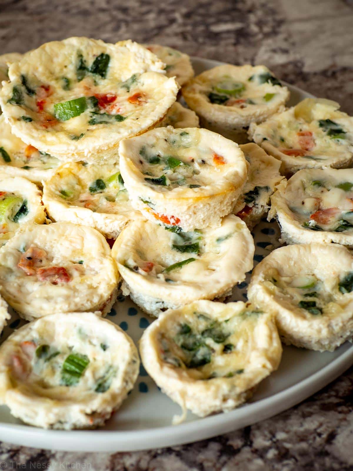 Plate of copycat Starbucks egg white bites in both mini muffin and regular muffin size.