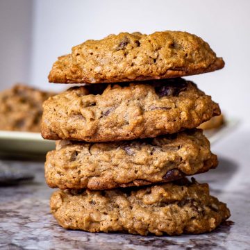 Oatmeal cookies stacked on one another.