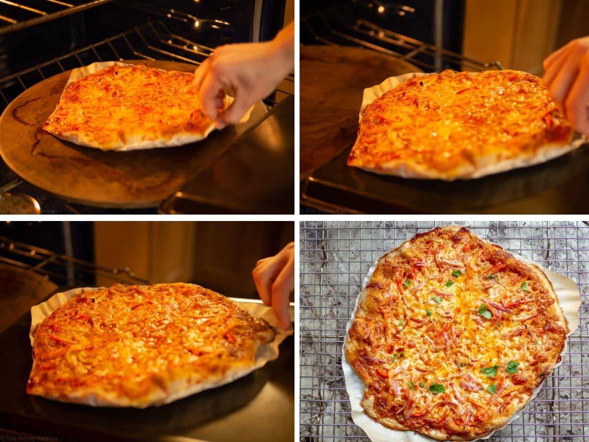 Cooked pizza being transferred from a stone to cooling rack.
