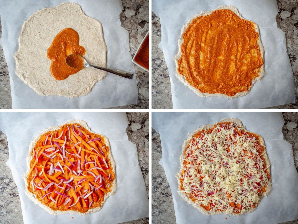 Pizza toppings being placed on prepared artisan pizza dough.