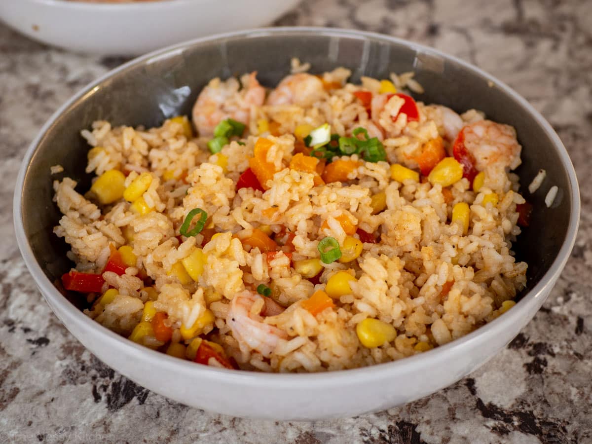 Cajun shrimp and rice that has been made with optional peppers added in.