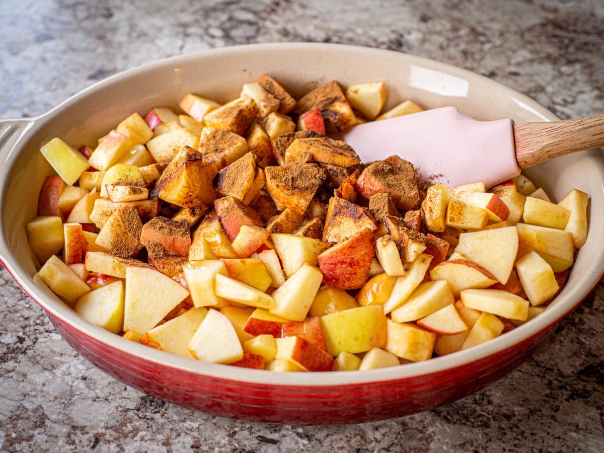 Apples mixed with cinnamon, vanilla and lemon juice.