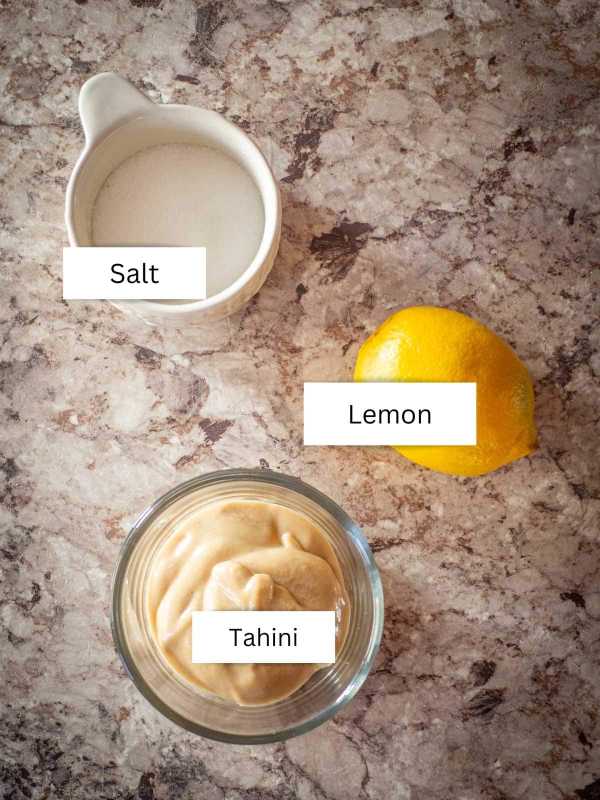 Ingredients for lemon tahini dressing.