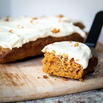 Piece of carrot cake on a cake lifter.