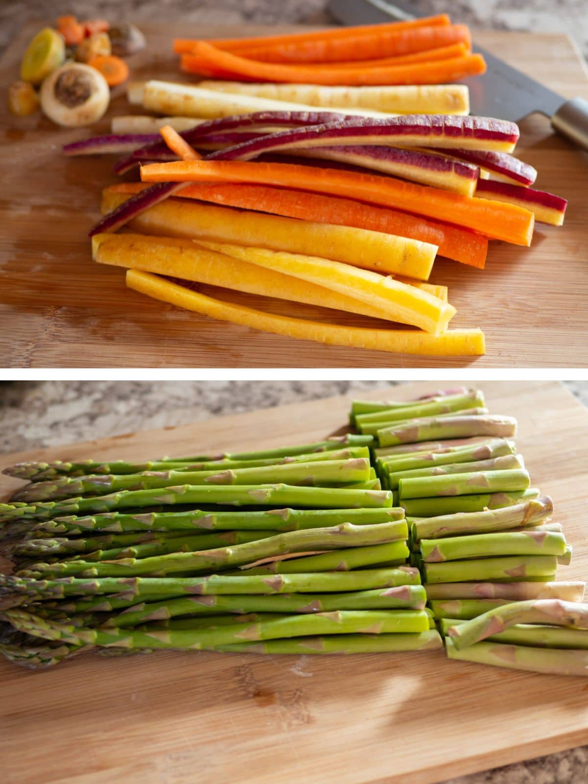 Sliced carrots and asparagus on a wooden cutting board.