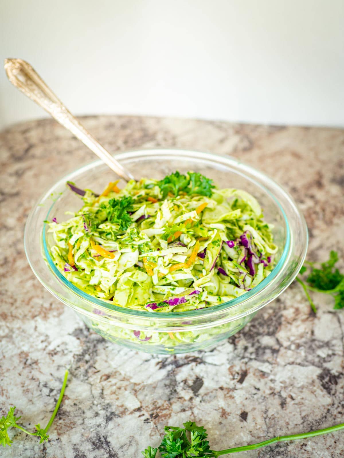 Bowl of chimichurri slaw topped with parlsey.