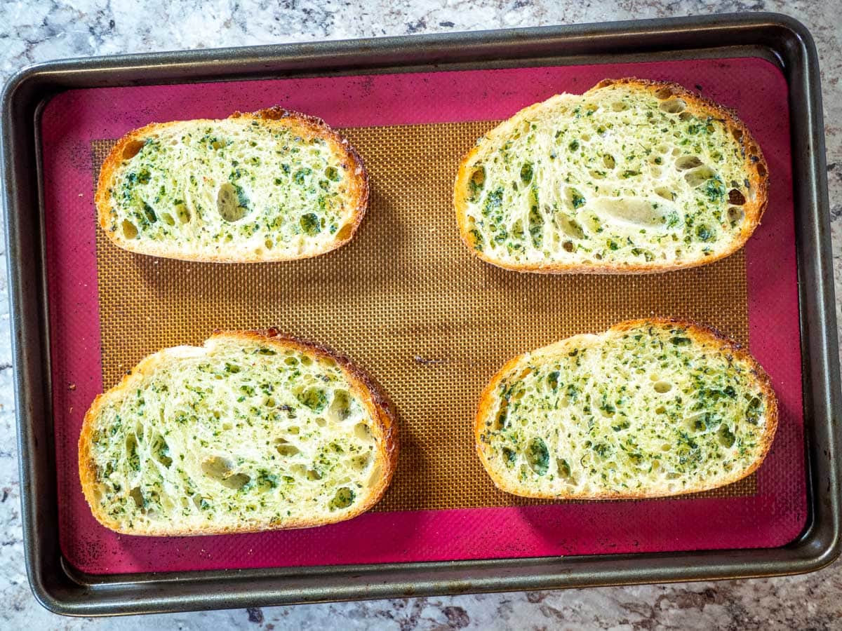 Lightly toasted sourdough garlic bread.