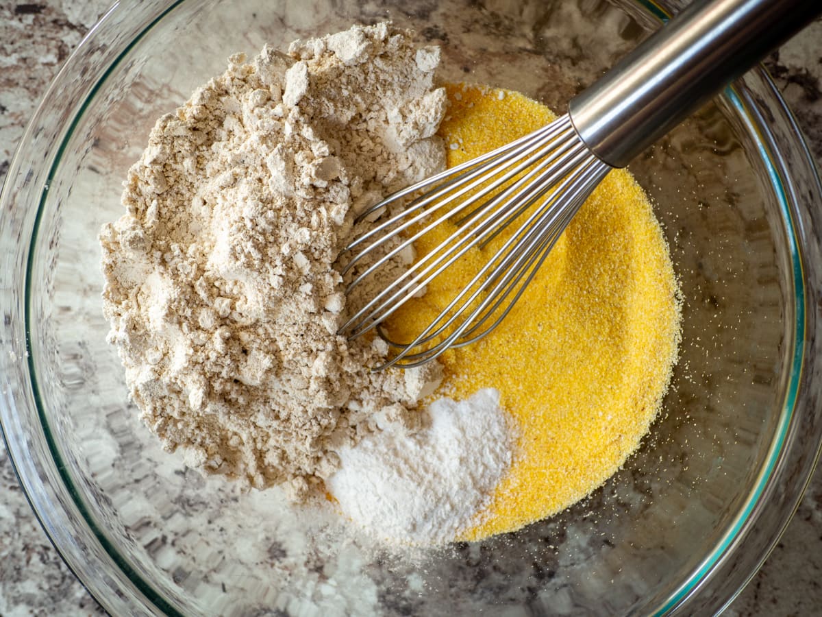 Dry ingredients whisked together in a bowl.