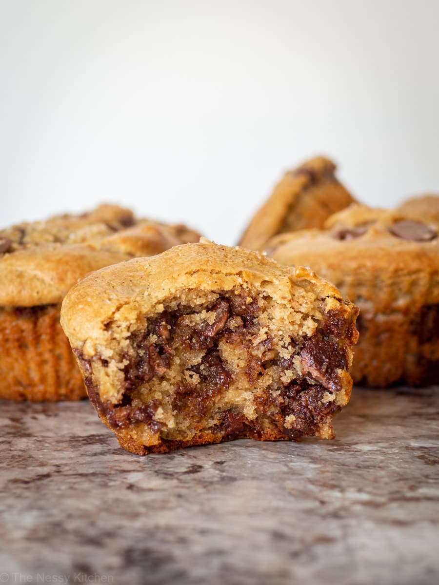 Close up of a muffin with a bite taken out.