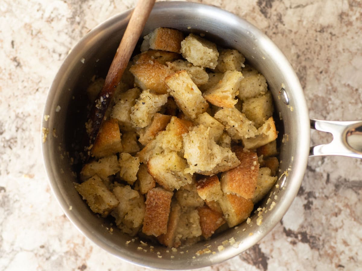 Sourdough stuffing cooking in a pot.