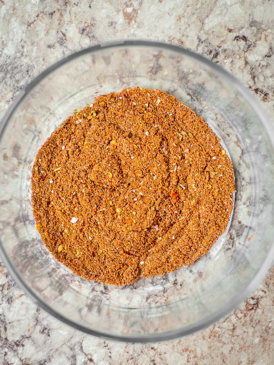 Bowl filled with taco seasoning mixture.