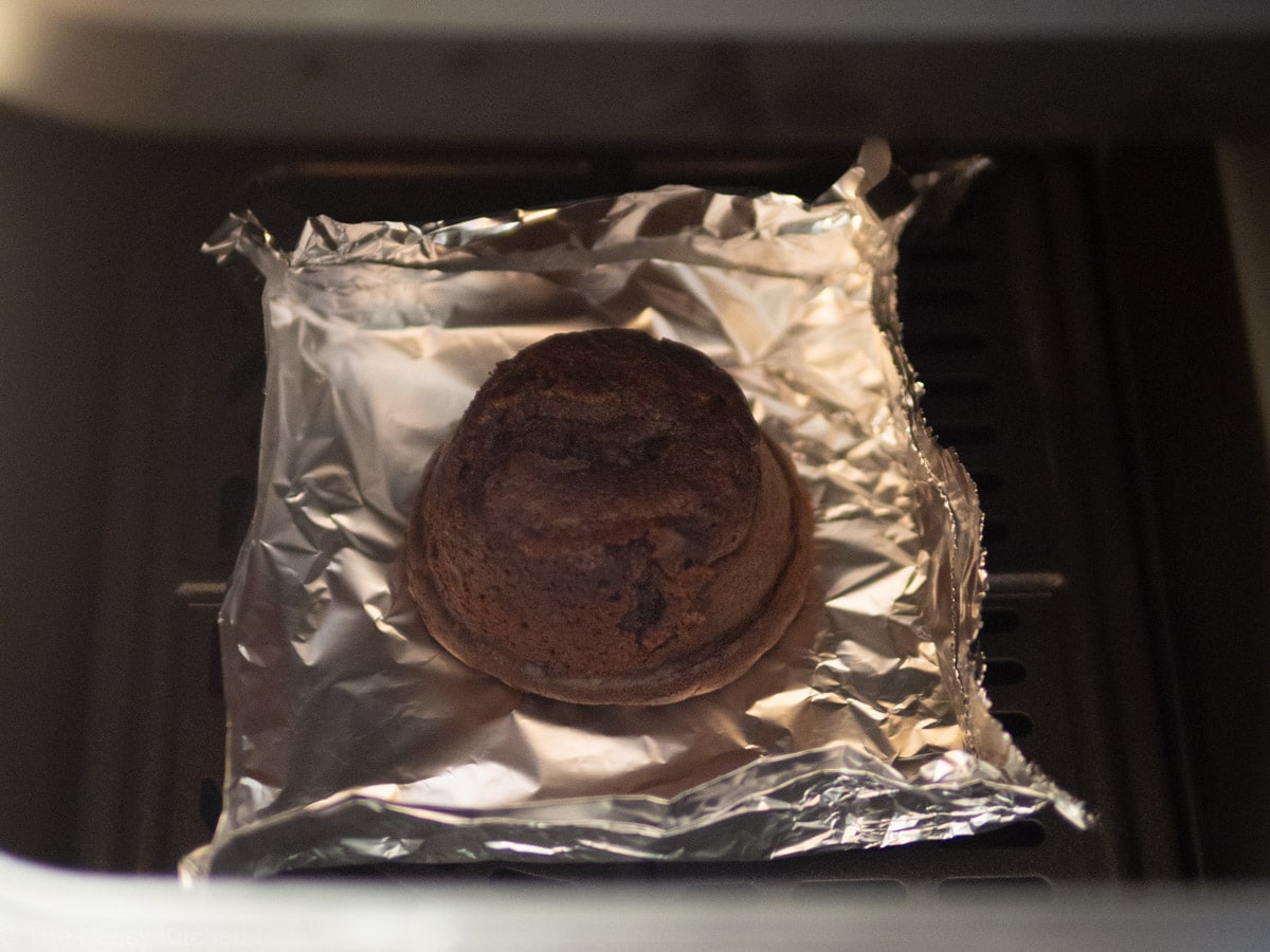Lava cake on foil in an air fryer.