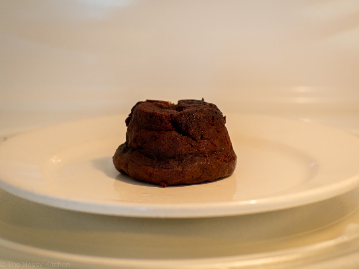 Lava cake on a plate in the microwave.