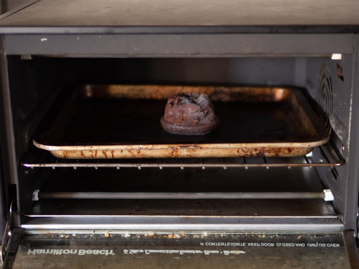 Lava cake reheating in a toaster oven.