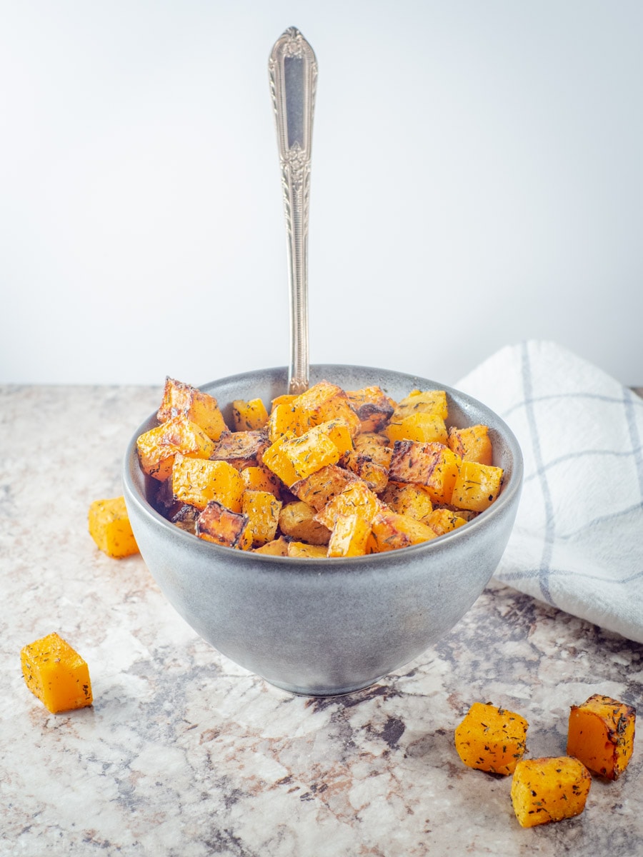 Squash in a bowl on a countertop.