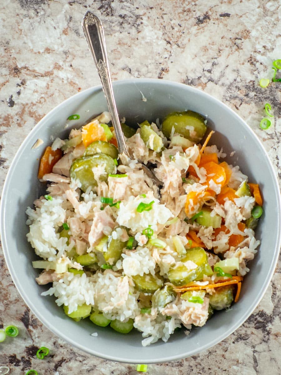 Tuna mixed with rice in a bowl.