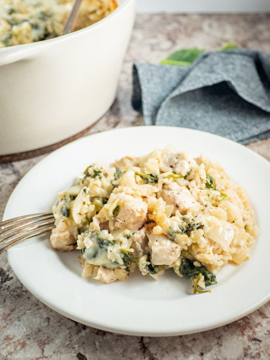 Chicken spinach casserole dished out onto a plate.