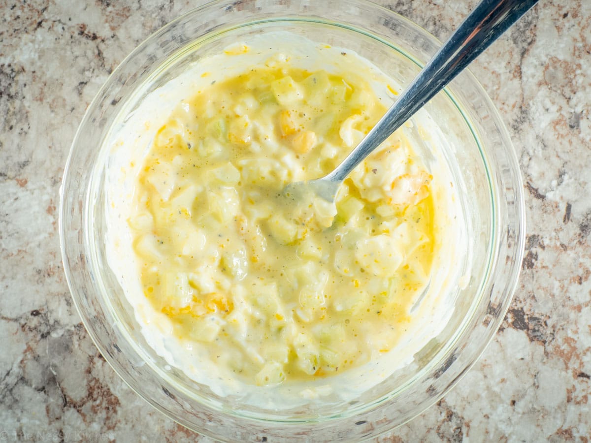 Egg salad mixed in a bowl.