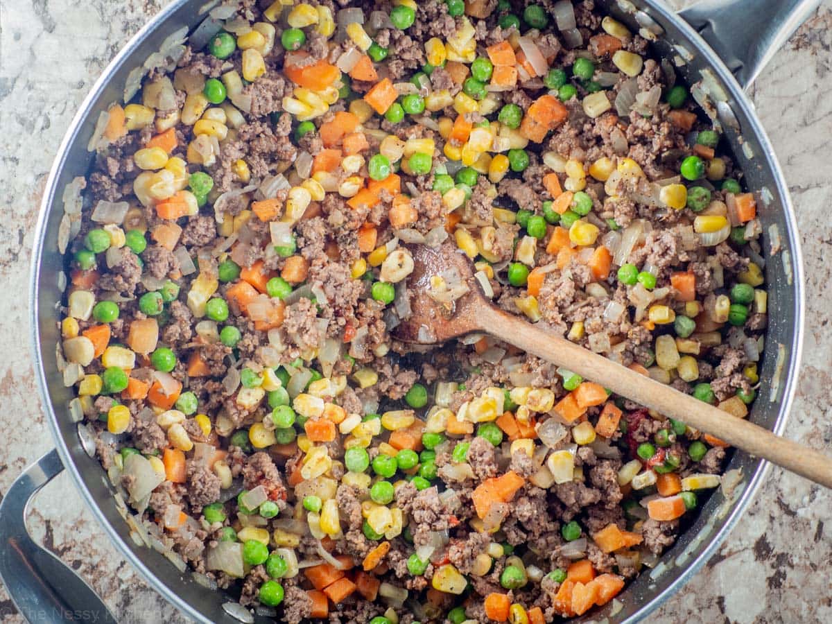 Filling mixed together in a skillet.