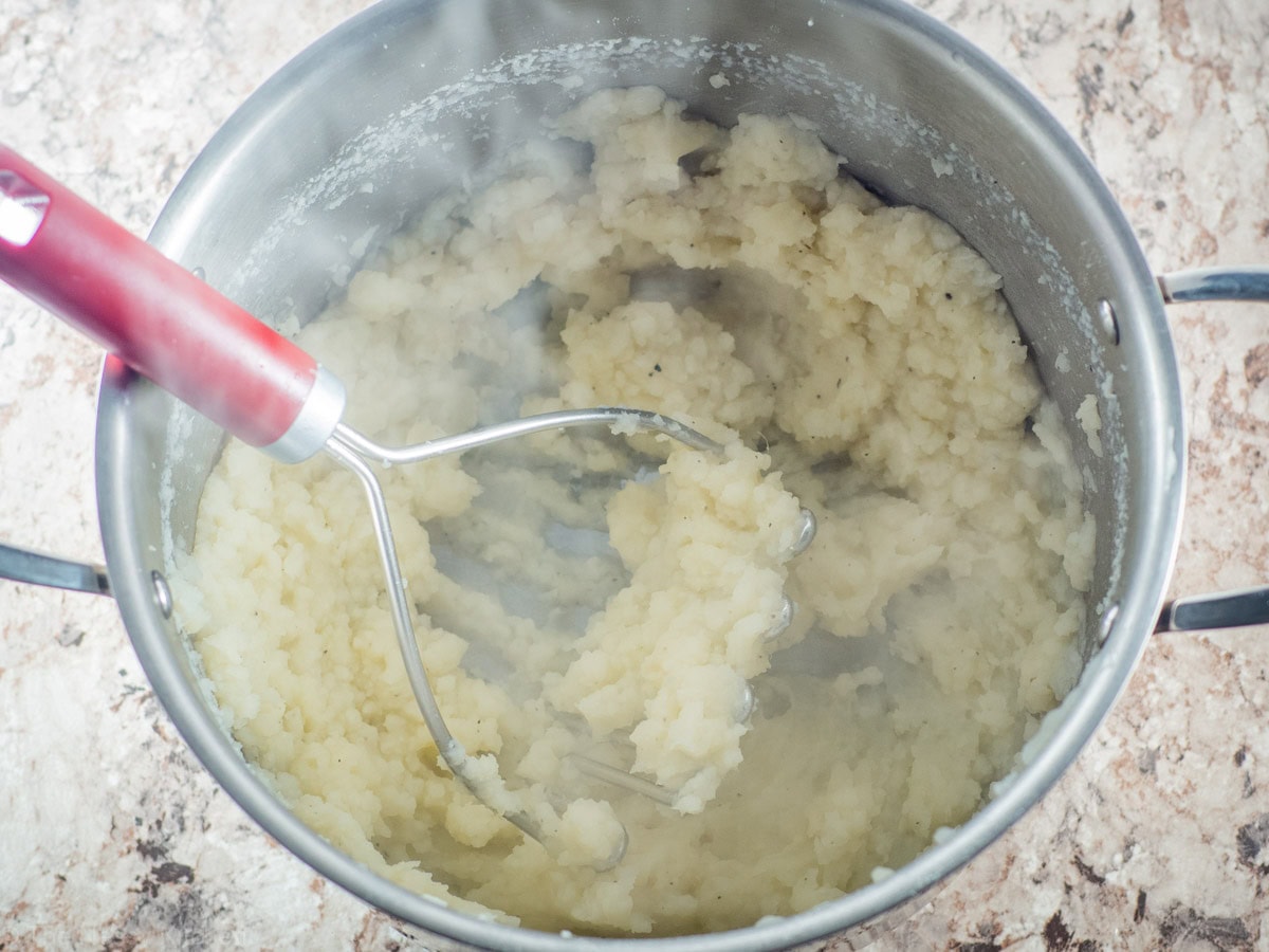 Potatoes mashed in a pot.