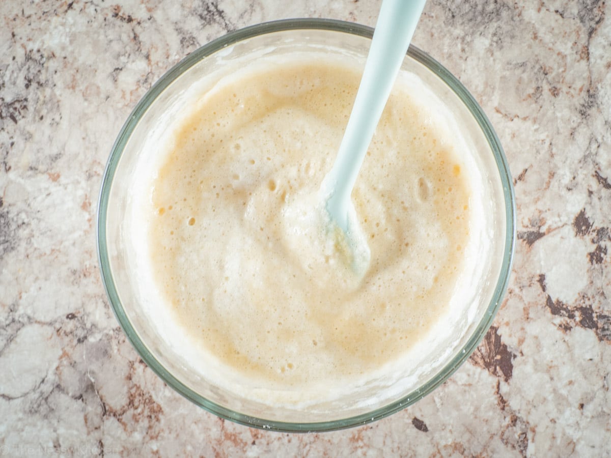 Batter in a bowl with a spatula.