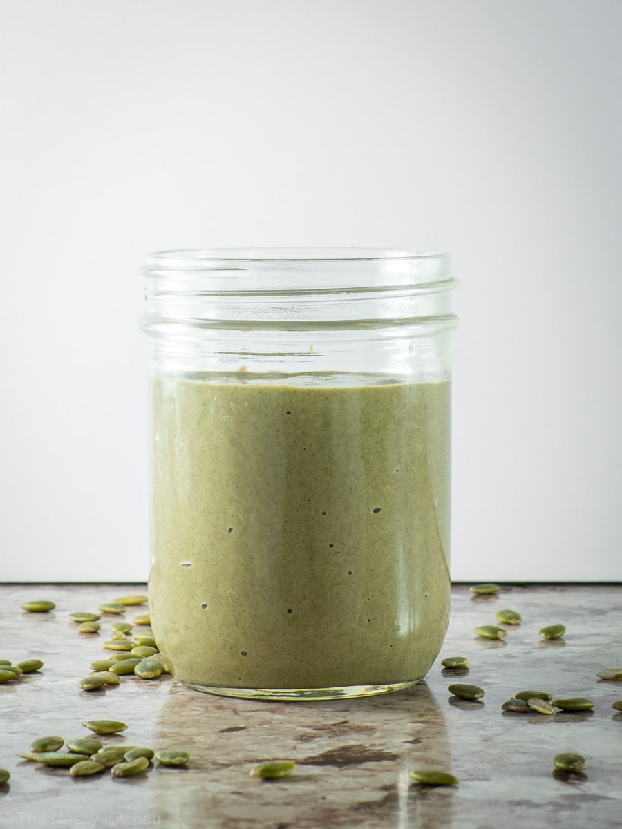 Mason jar full of pumpkin seed butter.