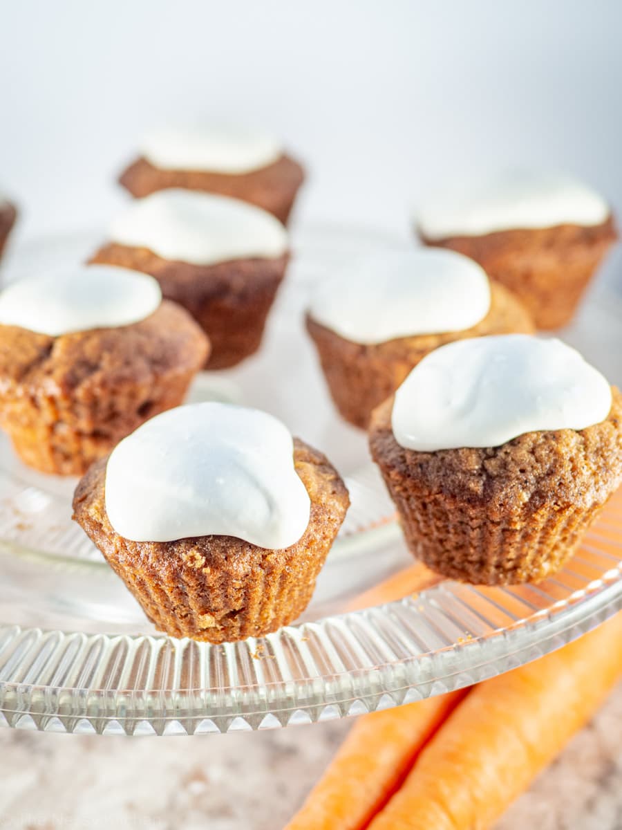 Oat flour carrot cupcakes on a tray.