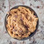 Edible cookie dough made from chickpeas in a bowl.