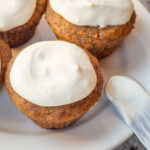Cupcakes topped with maple cream cheese frosting.